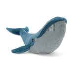 The Jellycat "Gilbert the Great Blue Whale, Gigantic" toy in blue and gray features a textured underside and is resting on its side.