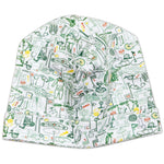 The Joy Street Baby Golf Hat, made from soft pima cotton, features green and yellow golf-themed illustrations of clubs, carts, and courses. It's an ideal baby gift for little ones with a love for the greens.