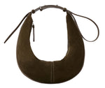 The Proenza Schouler Slide Suede Bag is a crescent-shaped brown shoulder bag featuring a slender strap and a small tassel, perfect for an effortlessly chic style.