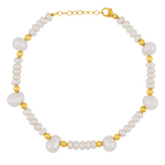 The Ocean Pearl Gold Bead Bracelet by Jia Jia features alternating pearls and 14k gold beads, with larger baroque pearls spaced evenly throughout.