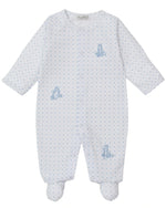 The Kissy Kissy Baby' Giraffe Grace Dotted Footie features white Pima cotton with blue polka dots, a giraffe pattern, long sleeves, covered feet, and front snaps—perfect cozy sleepwear for your baby.
