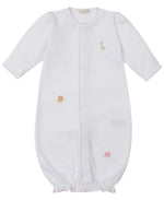 The Kissy Kissy Baby' Safari Wild Hand Emb. Convertible Gown is crafted from soft Peruvian cotton, features long sleeves, pink trim, and hand embroidery with a giraffe, lion, and elephant safari design.