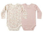 The Quincy Mae Baby Jersey Bodysuit 2-Pack includes two long-sleeve bodysuits in pink floral and pink/white stripes, made from soft organic brushed jersey with snap closures for easy changing.