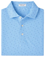 A folded light blue Peter Millar Old Fashioned Performance Mesh Polo with a subtle geometric pattern and three white buttons.