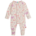 The Baby' It's a Paw-ty Convertible Coverall by Magnetic Me features pink and purple dog prints on cream, a multi-colored striped neckline, and magnetic closures for quick changes.