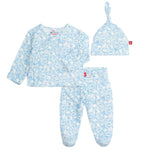 The Magnetic Me Baby Modal Kimono Take Me Home Set features a blue and white animal print kimono wrap top, pants, and a knotted hat, all crafted from soft, sustainable modal for cozy comfort. Displayed on a white background.