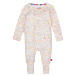 The Baby Modal Convertible Coverall by Magnetic Me is a vibrant onesie made from sustainable TENCEL™ modal. It showcases a rainbow collar with abstract animal prints and features handy magnetic closures down the front, all displayed on a flat white background.