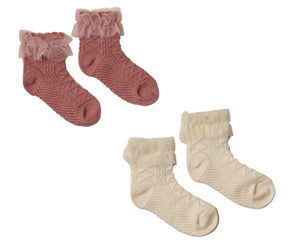 Noralee Ruffle Socks—two pairs for babies, featuring tulle ruffle tops in pink and cream, crafted from a soft cotton blend and shown on a white background.