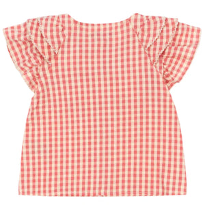 The Konges Slojd Girls' Kim Frill Shirt is a short-sleeved pink and white checkered seersucker blouse with ruffled shoulder frills, shown against a white background.