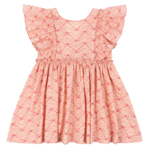 The Konges Slojd Girls' Ava Bow Dress features soft cotton in pink and cream, heart pattern, short ruffled sleeves, frill trim, and a gathered waist, shown laid flat on a white background.