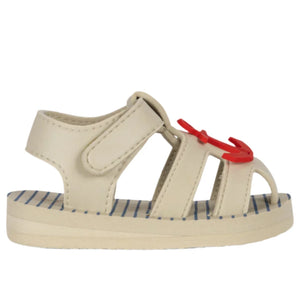 Konges Slojd Kids' Sable Sandal: beige summer sandals for babies, featuring velcro straps, open sides, striped EVA soles, and a small red bow on the front.