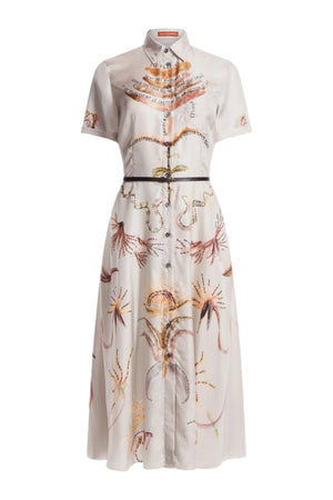 The Altuzarra Kiera Dress is a button-down, short-sleeve, collared midi with a belt and abstract multicolored embroidery on light fabric in a flattering A-line silhouette.