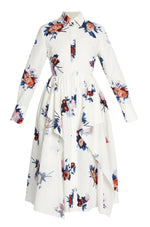 The Erdem Long Sleeve Midi Shirt Dress features white cotton poplin, a collared button front, an asymmetrical overlay, and vibrant blue, red, and purple rose bouquets.