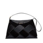 The 3.1 Phillip Lim ID Soft Shoulder Bag Woven Combo boasts a geometric patchwork with a short strap and rectangular flap closure, blending leather and suede for an elegant, unique style.