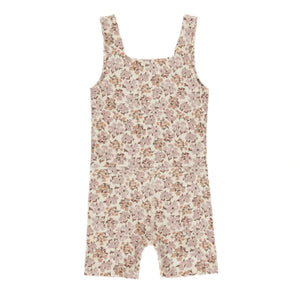The Girls' Malibu Bodysuit by Rylee & Cru features a sleeveless, square-neck design with a fitted waist, short legs, and a beige background adorned with an all-over wildflower print inspired by the brand’s signature style.