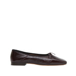 The Mansur Gavriel Square Toe Ballerina is a dark brown patent leather Mary Jane flat with a small front bow and black trim, shown in side profile on a white background—an elegant, timeless design.