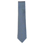 The Robert Jensen Peacock Motif Tie is a blue silk tie with a repeating light blue and white peacock-inspired design, shown against a white background.