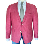 A mannequin showcases the Samuelsohn Bennet Contemporary Fit Blazer in rich red, paired with a white dress shirt, gray patterned tie, and blue jeans, epitomizing refined hand-tailored style against a white background.