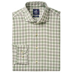 The Peirce Buttondown by Johnnie-O is a folded long-sleeve premium cotton shirt with a green and white plaid pattern, cutaway collar, front pocket, and cream-colored buttons.