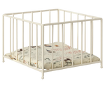 The Maileg Playpen, Micro is a white metal bunny playpen with vertical bars and includes a padded mat featuring animal and nature designs.