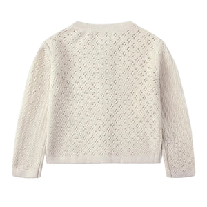 Back view of the Quincy Mae Baby Girls' and Girls' Knit Cardigan in cream, featuring long sleeves and a subtle pointelle eyelet pattern throughout the fabric.