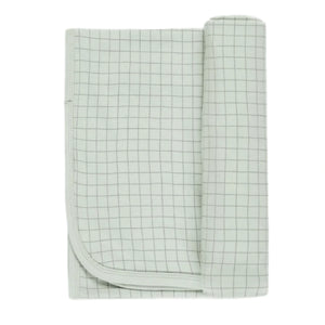 The Quincy Mae Baby Bamboo Swaddle is a soft, light-colored blanket with a simple grid pattern and stitched edges, shown partially rolled at one end.