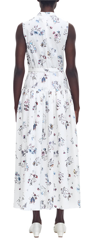 Viewed from the back against a plain background, a person wears the Arden Dress by Adam Lippes, a white sleeveless piece with floral patterns and a structured band collar, elegantly merging delicate design with luxurious Italian cotton poplin.