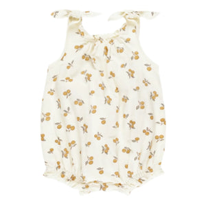 The Rylee & Cru Baby Girls' Shoulder Tie Bubble features a cream-colored fabric with a yellow fruit print, tie shoulder straps, elasticized leg openings, and bottom snaps for easy diaper changes.