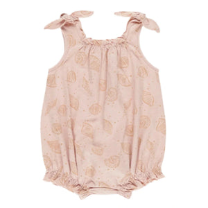 The Rylee & Cru Baby Girls' Shoulder Tie Bubble features an all-over seashell print, tie shoulder straps, ruffled leg openings, a gathered neckline, and bottom snaps for easy changes.
