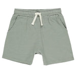 The Boys' Sam Short by Rylee & Cru in a light eucalyptus hue features airy cotton, an elastic waistband, and two side pockets, shown on a white background.
