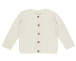 The Rylee & Cru Baby Girls' Crochet Cardigan features long sleeves, a scalloped trim, and five coconut buttons on the front in a cream hue.