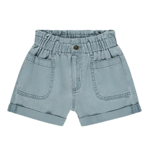 The Girls' Alba Shorts by Rylee & Cru feature light blue denim in the brand's ocean hue, with an elastic waistband, front button closure, and two front pockets, shown on a white background.