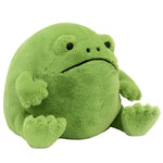 The Jellycat Ricky Rain Frog is a round, green plush with short limbs and black eyes, sitting upright against a white background—a squishy, huggable toy for comfort whenever you need it.