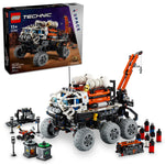 LEGO® Technic Mars Crew Exploration Rover set by LEGO®, includes a detailed rover, crane, scientific tools, and accessories—ideal for Mars mission fans. Comes with box and displayed on a white background.
