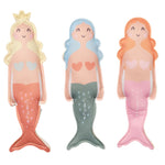 The Sunnylife Dive Buddies features three plush mermaid dolls with smiling faces and heart-shaped tops, each sporting pink, green, and peach tails. They're perfect for imaginative summer water play!.