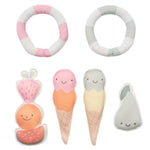 The Dive Buddies Set of 6 by Sunnylife includes soft plush toys with two inflatable rings, a fruit stack, pear, and dual ice creams in pastel hues for fun water play that improves water confidence and skills.