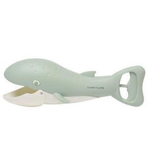 The Sunnylife Sand Claws, shaped like a mint green whale, features a tail handle and open mouth for easy scooping, blending creativity with unique kitchenware design.
