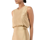 Ann Mashburn’s Gia Silk Shantung Top in beige is shown sleeveless and paired with matching high-waisted pants, modeled from the shoulders to the hips.