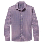 The Faherty Movement Sport Shirt is a long-sleeved, button-up crafted from wrinkle-resistant Supima cotton and features a purple and blue plaid pattern.