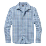 The Movement Sport Shirt by Faherty is a light blue plaid long-sleeve button-up made from wrinkle-resistant Supima cotton with a hint of stretch, showcasing a classic collar against a white background.