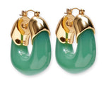 The Lizzie Fortunato Organic Gold Hoops feature shiny tops and thick, green translucent resin for a bold contrast, shown against a white background.