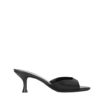 The Brigitte Satin Mule by Staud is a black open-toe mule with a mid-height stiletto heel and minimalist design, shown in side profile on a white background—perfect for versatile dressing.