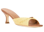 The Brigitte Raffia Mule by Staud is a high-heeled, open-toe mule featuring a woven raffia yellow upper and chic kitten heel, complemented by a tan sole.