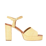 The Staud Jodie Platform Heel features a beige woven texture, chunky block heel, square open toe, and an ankle strap.