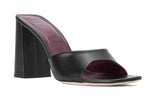 A women's black leather mule with a chunky heel by Staud Sloane Heel.