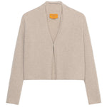 The Stealth Cardigan by Guest in Residence is a beige, cropped cashmere cardigan with long sleeves and an open front, shown against a white background.
