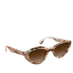 The Sasha sunglasses by Krewe, with their marbled brown and gray acetate cat-eye frames and gradient brown lenses, make a striking fashion accessory against a white background.