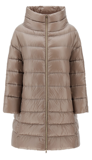 The Herno Matilde Coat is a beige, shiny quilted puffer jacket made with ultra-fine goose down. It features a high collar and three-quarter sleeves and is elegantly showcased on a plain white background.