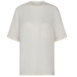 The TWP Big Boy Skye Cashmere Tee is an oversized white t-shirt featuring a round neckline and single chest pocket, shown against a white background.