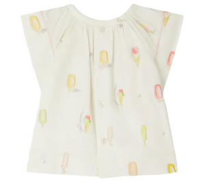 Bonpoint's Baby Girls' and Girls' Alisia Blouse in ice-cream printed poplin features a white, sleeveless design—perfect as a playful summer blouse for kids.
